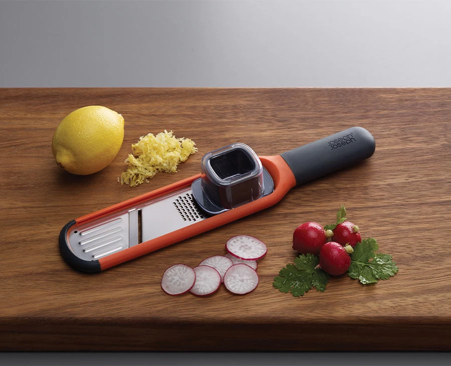 Joseph Joseph Handi-Grate™ Orange 2-in-1 Mini Grater & Slicer 2 Joseph Joseph Handi-Grate™ Orange 2-in-1 Mini Grater & Slicer - Image 2