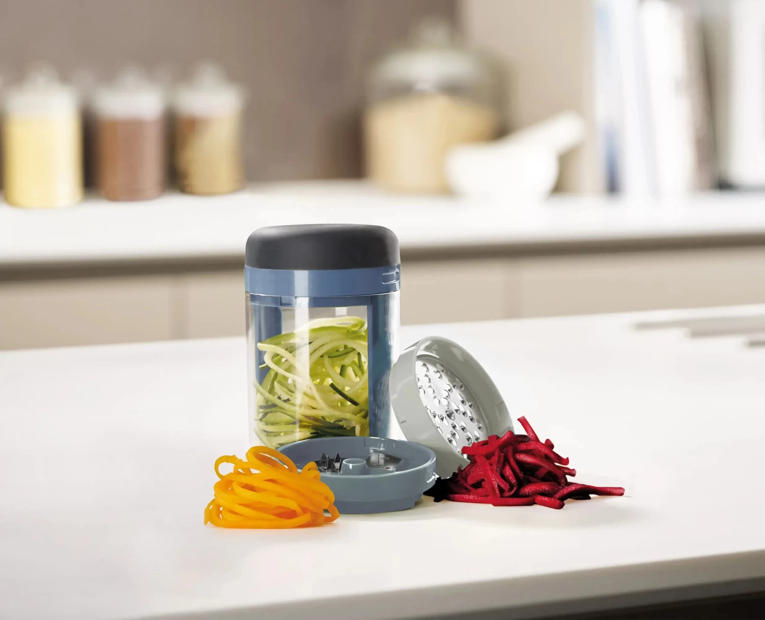 Joseph Joseph Spiro™ Blue Hand-held Spiralizer - Editions 3 Joseph Joseph Spiro™ Blue Hand-held Spiralizer - Editions - Image 3